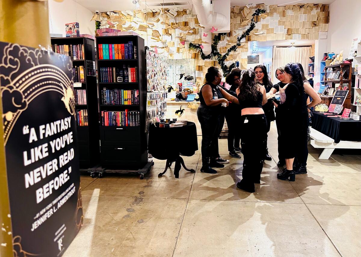 Staff huddle inside a book store