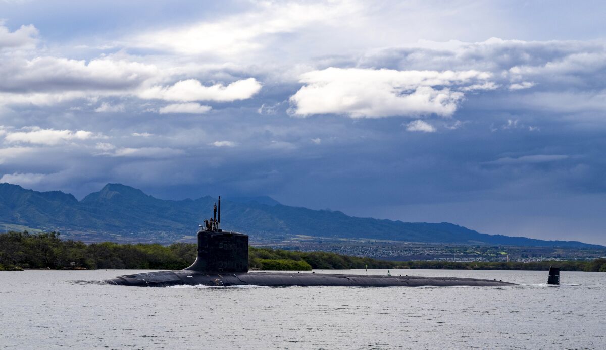 FILE - In this file photo provided by U.S. Navy, the Virginia-class fast-attack submarine USS Missouri (SSN 780) departs Joint Base Pearl Harbor-Hickam for a scheduled deployment in the 7th Fleet area of responsibility, Sept. 1, 2021. The foreign ministers of Malaysia and Indonesia expressed concern Monday, Oct. 18, 2021, that Australia’s plan to acquire nuclear-powered submarines from the U.S. in a security alliance may increase the rivalry of major powers in Southeast Asia. (Amanda R. Gray/U.S. Navy via AP, File)