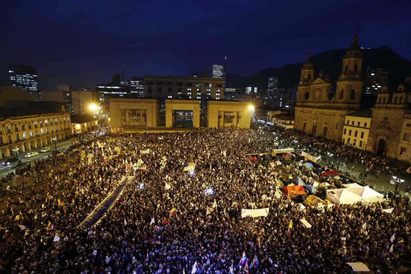 Despite thousands turning out to support peace in Colombia, the national peace referendum was narrowly defeated, revealing deep divisions within the country.