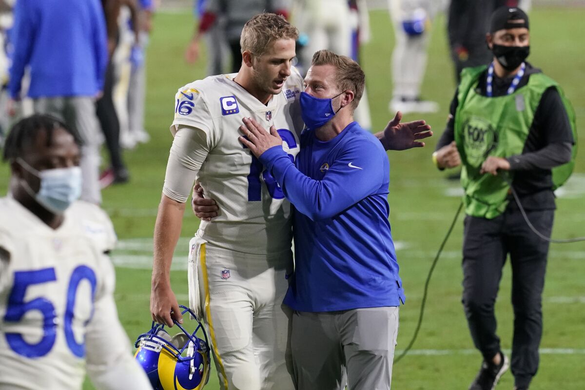 Los Angeles Rams head coach Sean McVay greets quarterback Jared Goff (16) after an NFL football game against the Arizona Cardinals, Sunday, Dec. 6, 2020, in Glendale, Ariz. The Rams won 38-28. (AP Photo/Ross D. Franklin)