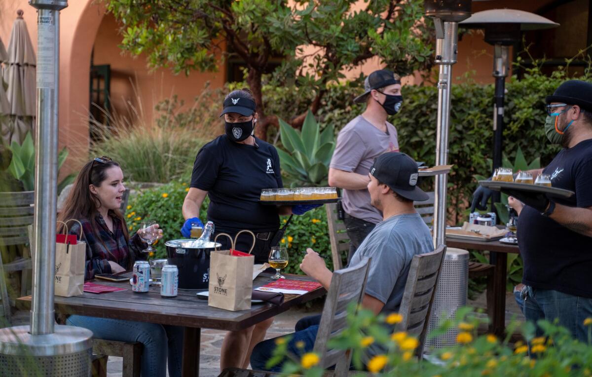 Stone Brewing World Bistro & Gardens at Liberty Station can serve customers on its patio while taking COVID precautions.