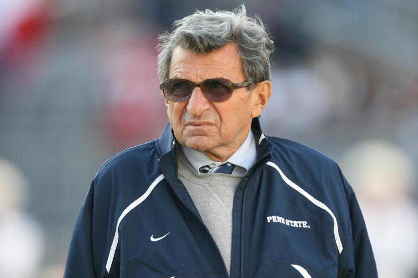Penn State football coach Joe Paterno looks on before a game against Ohio State in November 2009.