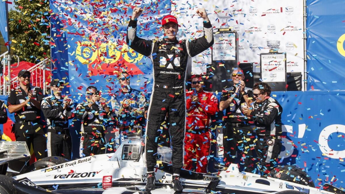 Simon Pagenaud celebrates after winning an IndyCar Series race in Toronto on Sunday.