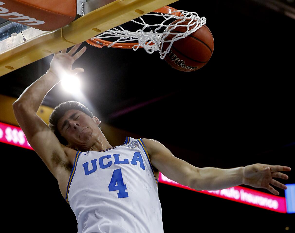 UCLA guard Jaime Jaquez Jr. throws down a dunk against San Jose State in the first half.