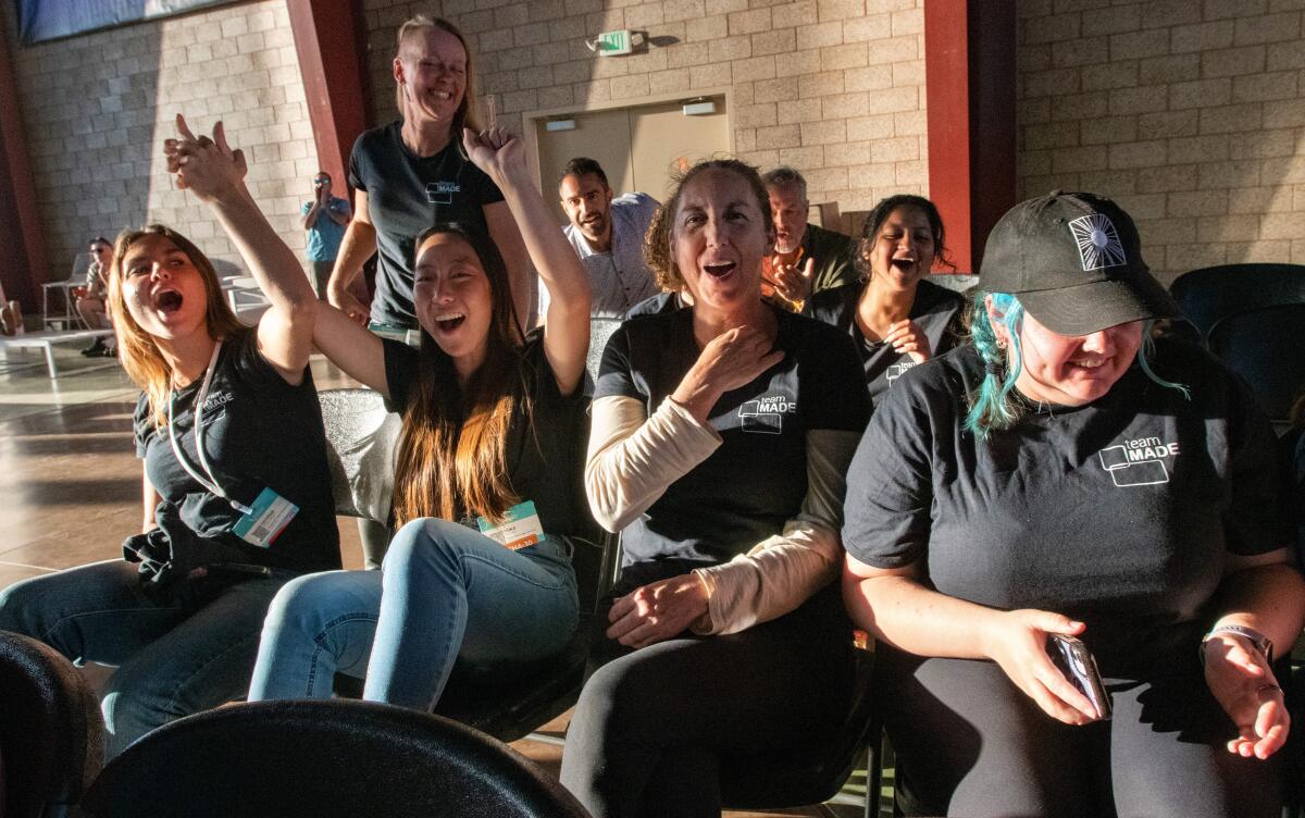 Members of teamMADE cheer upon winning second place overall in the first Orange County Sustainability Decathlon on Oct. 14.