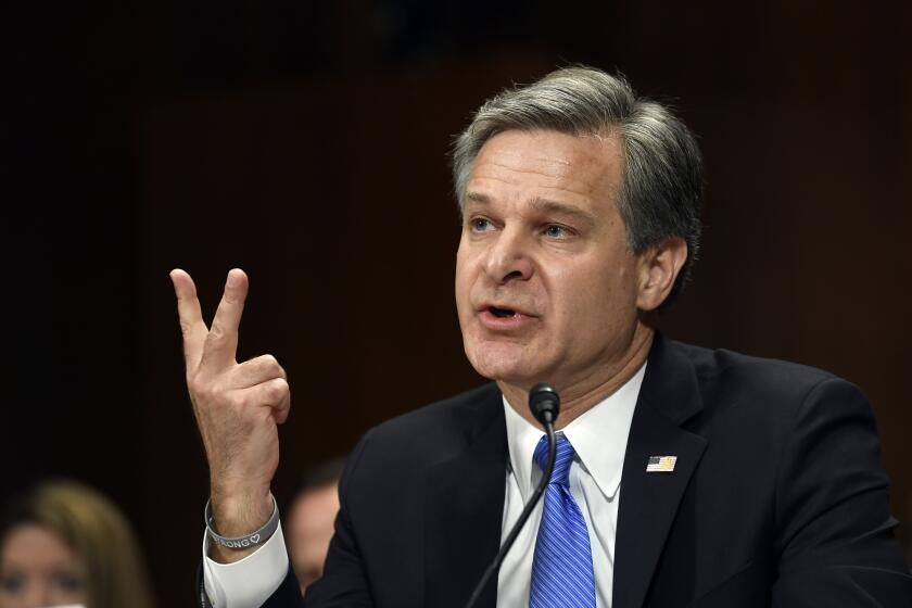FBI Director Christopher Wray testifies before the Senate Judiciary Committee on Capitol Hill in Washington, Tuesday, July 23, 2019. Wray's appearance before the committee could be something of a preview of the intense questioning special counsel Robert Mueller is likely to face in Congress the next day. (AP Photo/Susan Walsh)