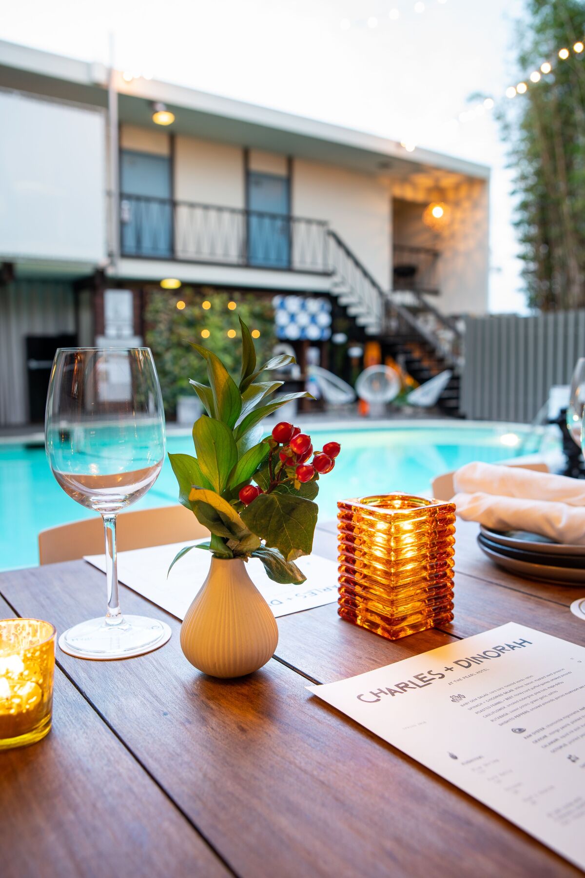 Charles + Dinorah's poolside patio at The Pearl Hotel is retro cool. 
