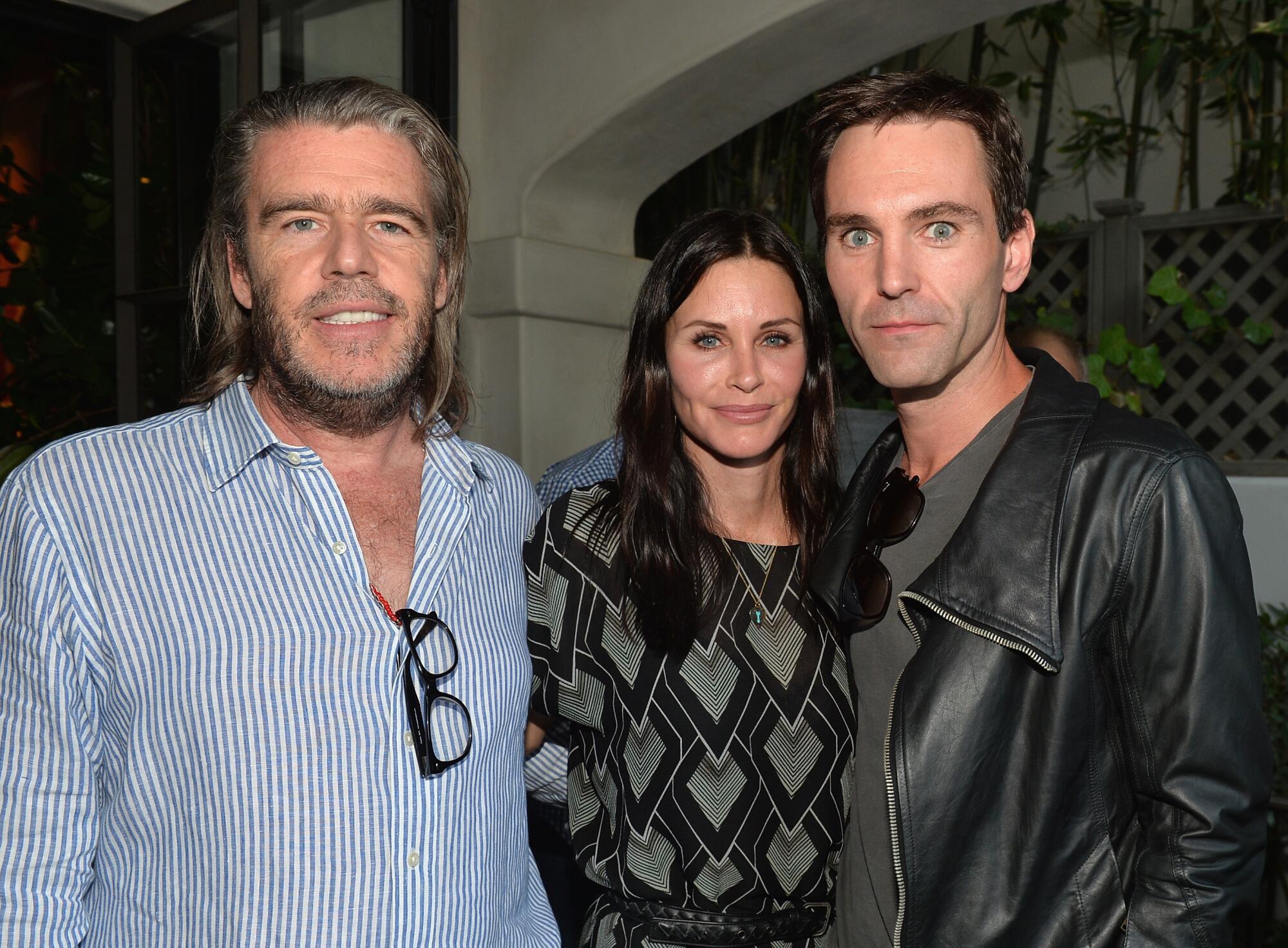 Author Kevin Morris, actress Courteney Cox and songwriter Johnny McDaid 