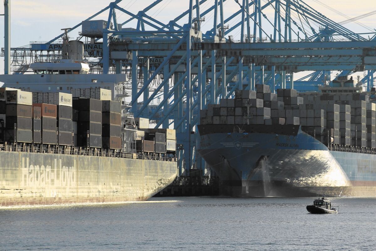 A container ship is docked at the Port of Los Angeles on Terminal Island.