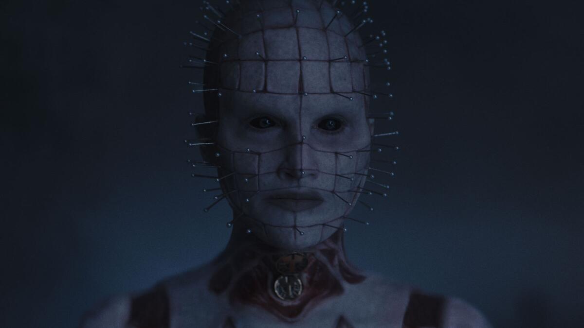 A bald person with pins sticking out of their head in the movie "Hellraiser."