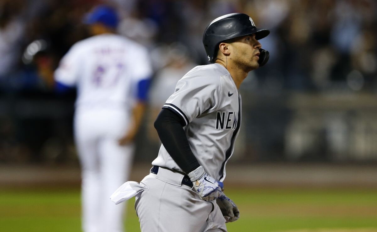 New York Yankees' Gleyber Torres rounds the base after hitting a two-run home run against New York Mets' Jeurys Familia during the sixth inning of a baseball game on Sunday, Sept. 12, 2021, in New York. (AP Photo/Noah K. Murray)