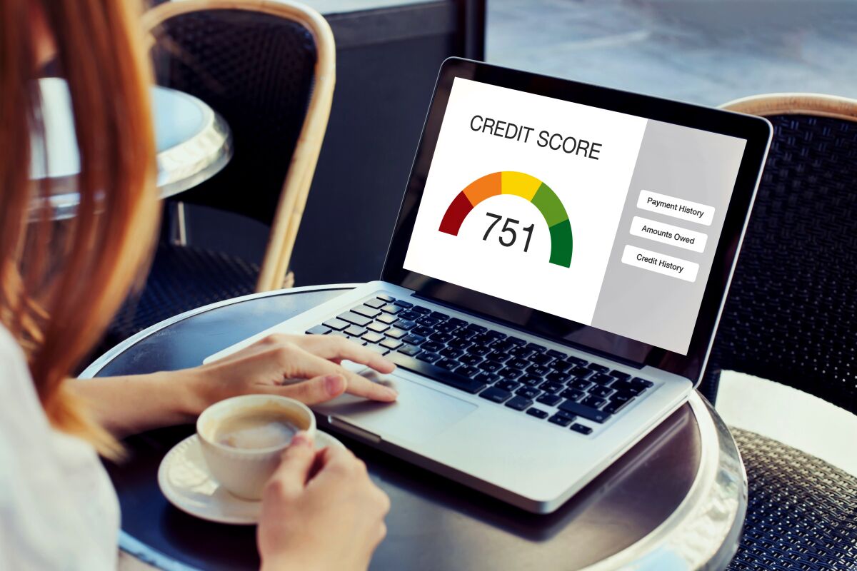 A credit score on a laptop screen
