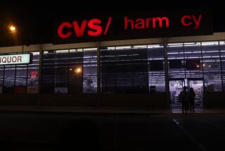 Inglewood, CA - August 30: People walk into a CVS/Pharmacy on Friday, Aug. 30, 2024 n Inglewood, CA. (Michael Blackshire / Los Angeles Times)