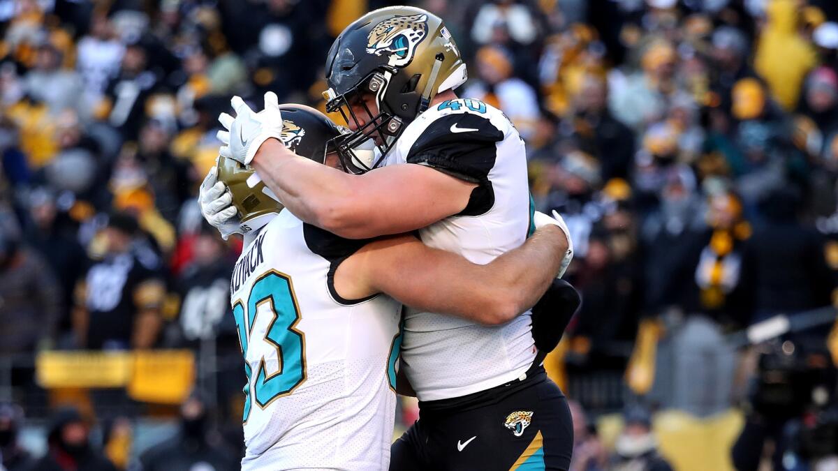 Jacksonville fullback Tommy Bohanon (40) celebrates with teammate Ben Koyack (83) after catching a touchdown pass against the Steelers during the fourth quarter Sunday.