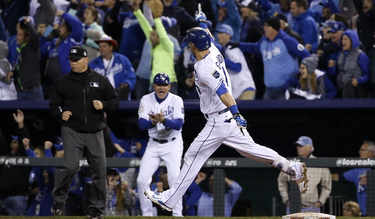 Kansas City Royals' Alex Gordon celebrates after hitting a solo home run during the ninth inning of Game 1 of the World Series against the New York Mets on Tuesday.