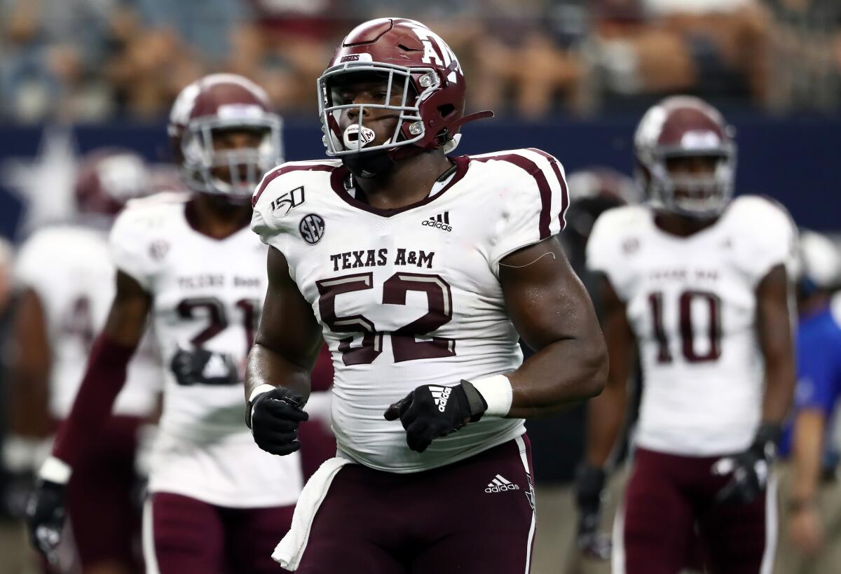Justin Madubuike of Texas A&M prepares for the next play against Arkansas in September.