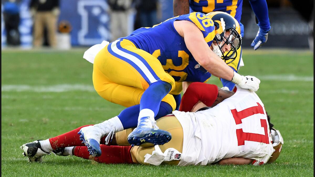 Rams safety Cody Davis is called for a penalty while hitting 49ers receiver Jeremy Kerley during the fourth quarter.