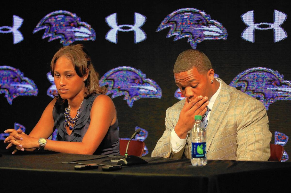Baltimore Ravens running back Ray Rice pauses during a May 23 news conference with his wife, Janay Rice, whom he is accused of assaulting at a casino in February when they were engaged.