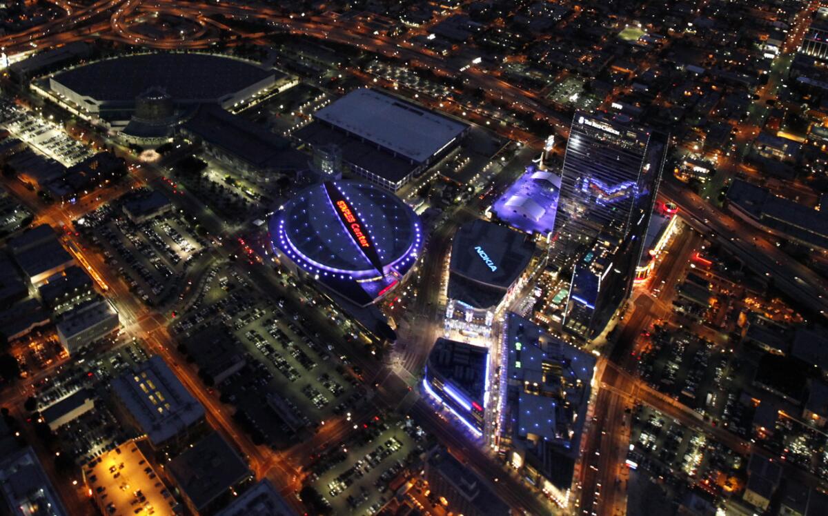 An aerial view of Staples Center and L.A. Live campus in a 2010 file photo. A former intern is suing the Sterling Family Trust, claiming he should have been paid for work he performed as a Clippers intern.