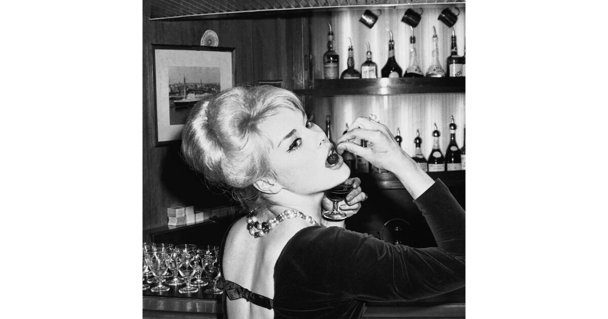 Photo: latimes.com Elke Sommer, in a black and white photo, poses at a bar in 1960