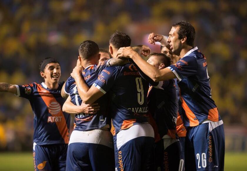 Puebla celebrates a goal against Tigres on Nov. 10, 2018 from the tournament Apertura of 2018 at the University stadium of Monterrey, Mexico. EPA-EFE FILE/Miguel Sierra.