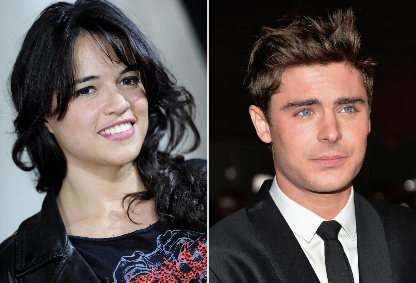 Michelle Rodriguez and Zac Efron share a smooch on vacation