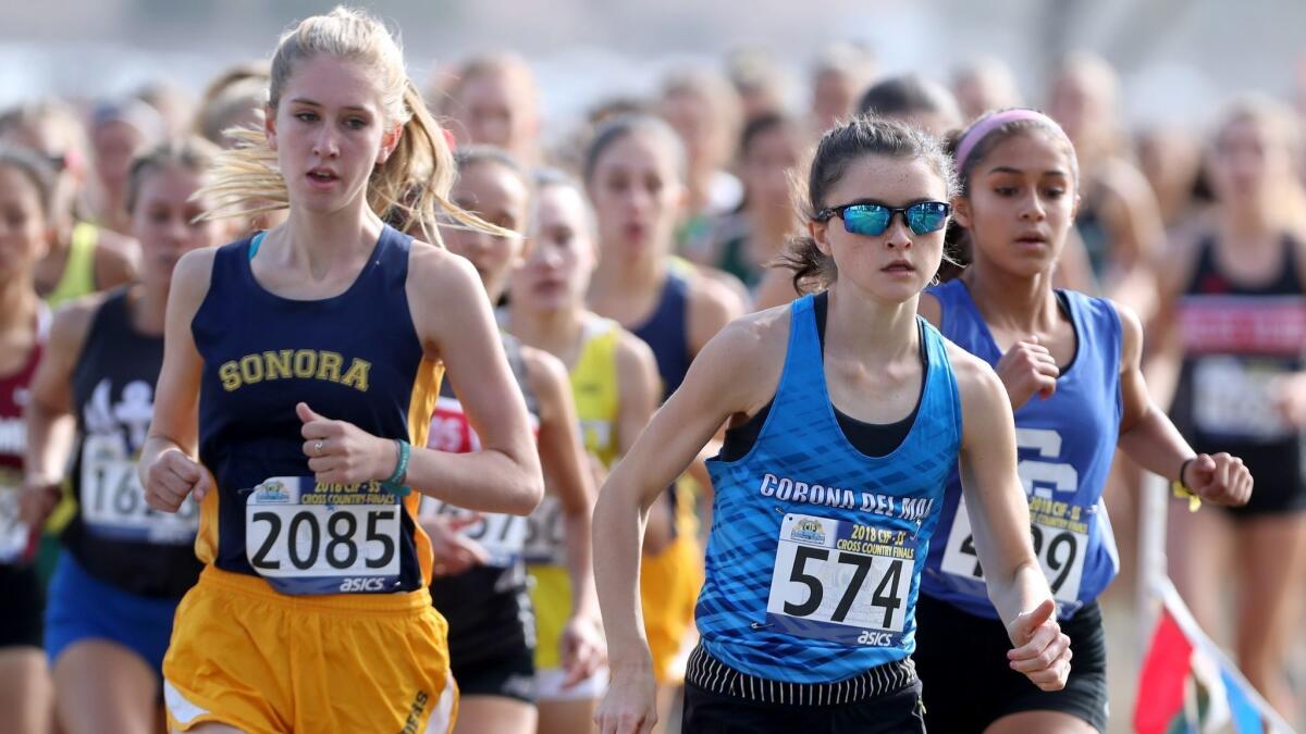 Corona del Mar High's Annabelle Boudreau competes in the CIF Southern Section Division 3 girls' race at the Riverside City Cross Country Course on Nov. 17.