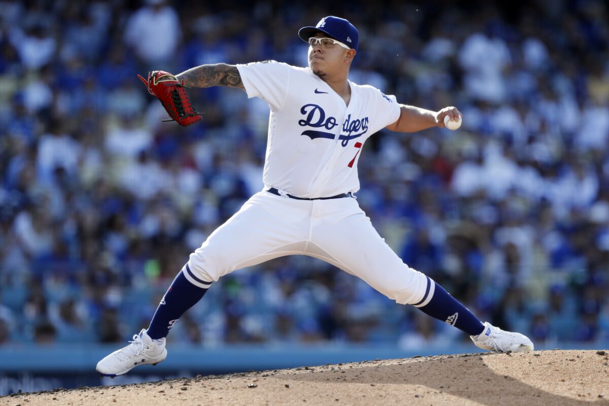 Dodgers starter Julio Urías delivers in the first inning against the Chicago Cubs on June 26, 2021.