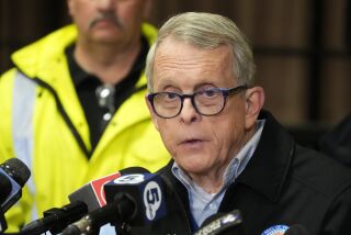 Ohio Gov. Mike DeWine meets with reporters after touring the Norfolk Southern train derailment site in East Palestine, Ohio, Monday, Feb. 6, 2023. (AP Photo/Gene J. Puskar)