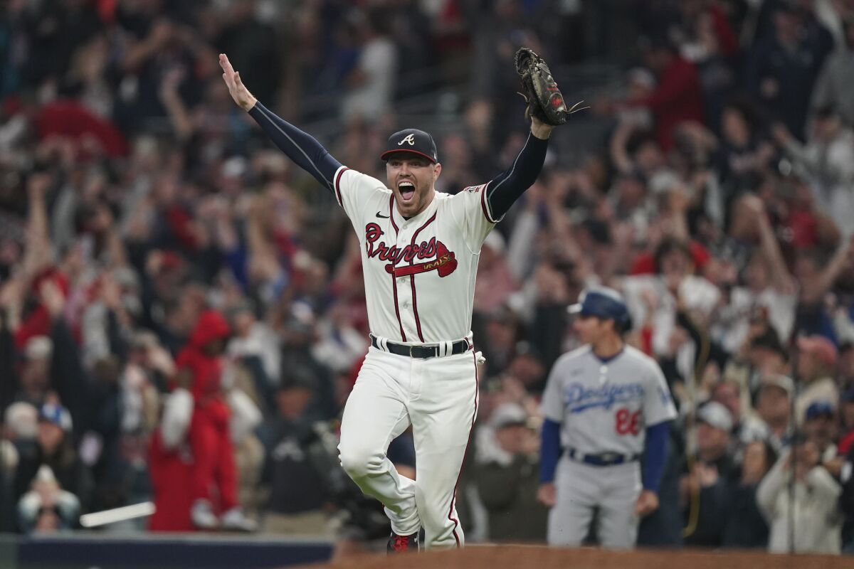 Freddie Freeman reacts after the Atlanta Braves defeated the Dodgers to win the 2021 National League Championship Series.
