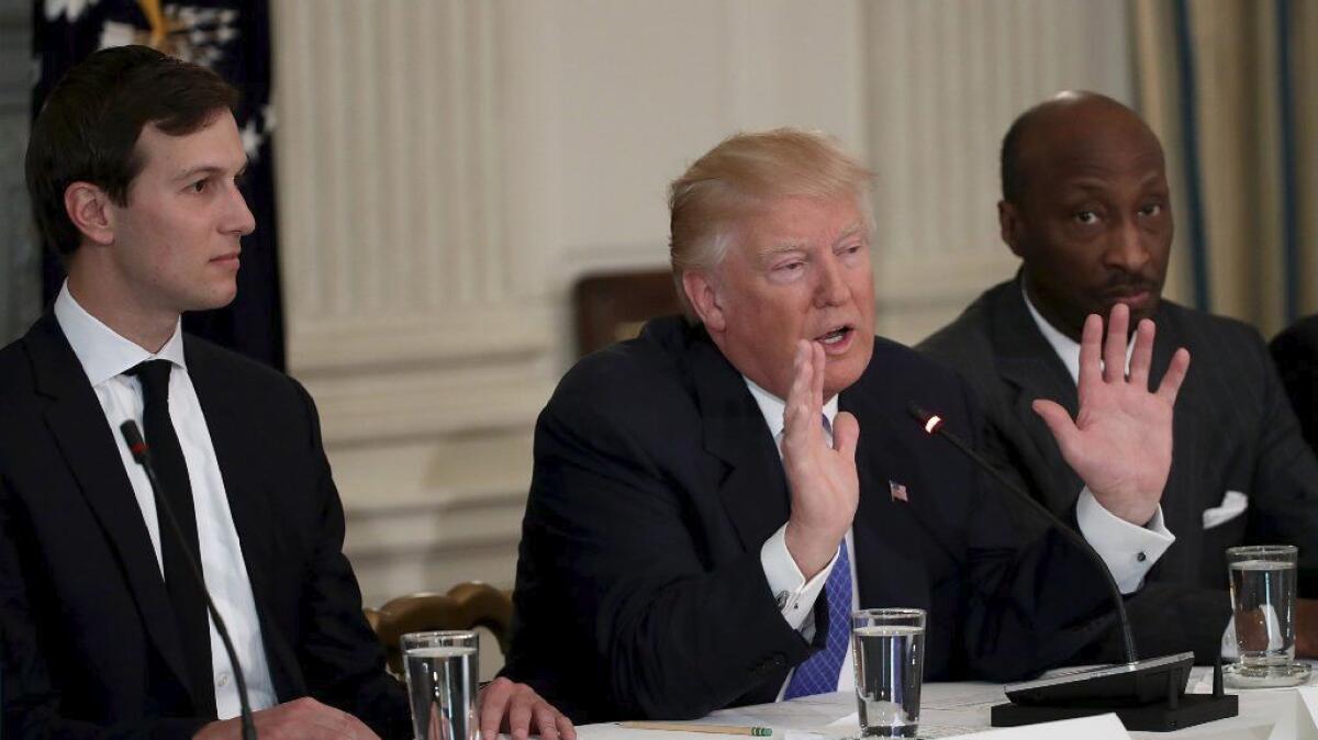 President Trump speaks during the opening of a listening session with manufacturing CEOs in the White House.