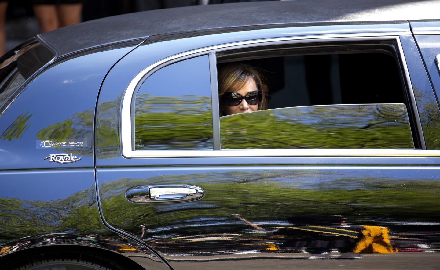 Melissa Rivers looks at a group of bagpipers as she leaves the funeral for her mother, Joan Rivers, at Temple Emanu-El in New York, Sept. 7.