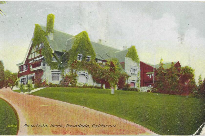A driveway and wide lawn leads to a large home. Text: "An artistic Home, Pasadena, California"
