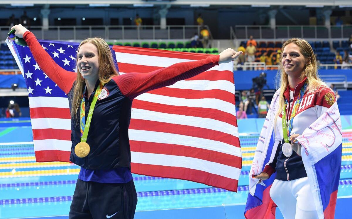 Lilly King, left, has strong opinions about drug cheats.