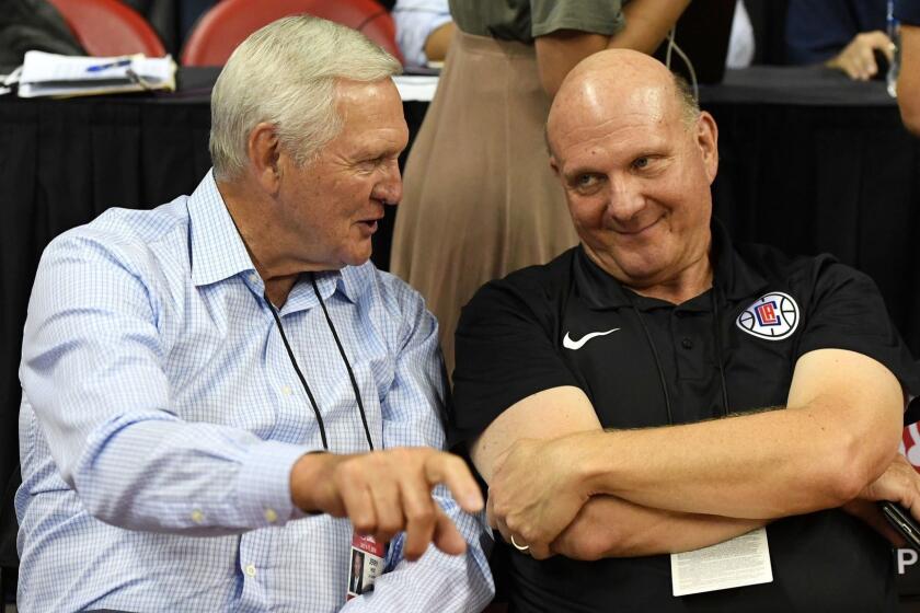 LAS VEGAS, NV - JULY 06: Los Angeles Clippers executive board member Jerry West (L) and Clippers owner Steve Ballmer talk as they attend a 2018 NBA Summer League game between the Dallas Mavericks and the Phoenix Suns at the Thomas & Mack Center on July 6, 2018 in Las Vegas, Nevada. The Suns defeated the Mavericks 92-85. NOTE TO USER: User expressly acknowledges and agrees that, by downloading and or using this photograph, User is consenting to the terms and conditions of the Getty Images License Agreement. (Photo by Ethan Miller/Getty Images) ** OUTS - ELSENT, FPG, CM - OUTS * NM, PH, VA if sourced by CT, LA or MoD **