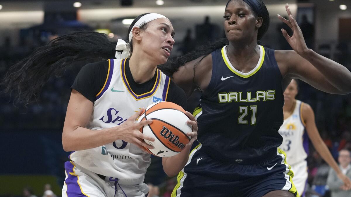 Los Angeles Sparks forward Dearica Hamby (5) grabs a rebound