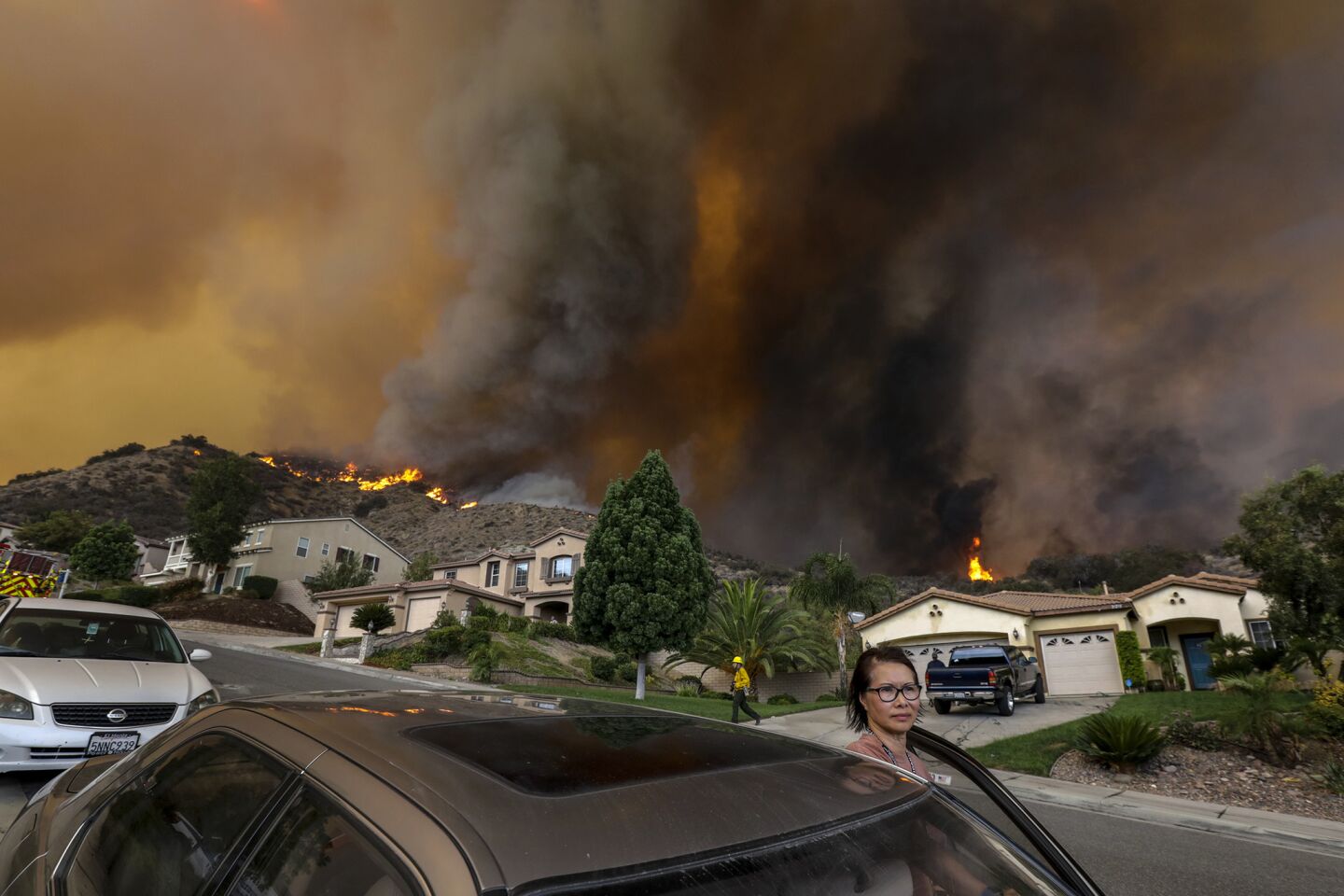 Residents evacuate the 29000 block of Sandpiper Drive in Lake Elsinore as the Holy fire approaches homes.