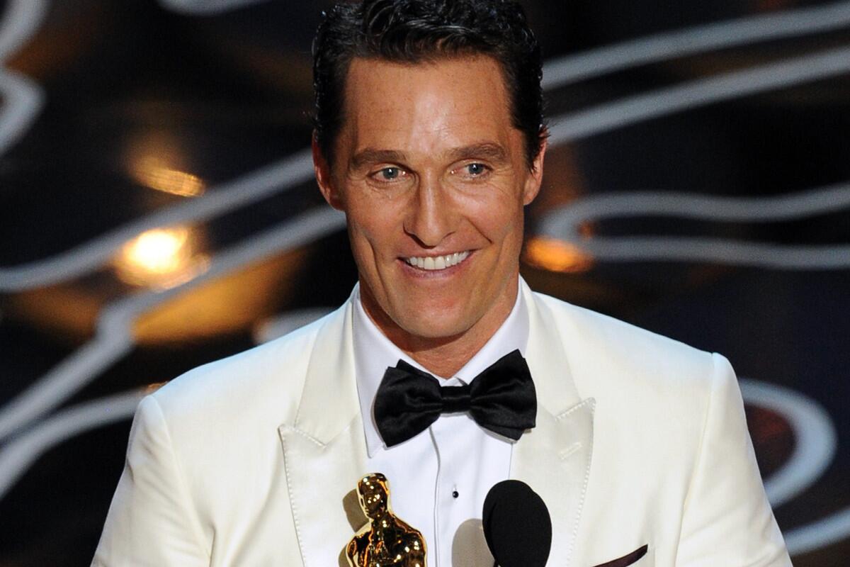 Matthew McConaughey accepts the Oscar for lead actor for his role in 'Dallas Buyers Club.'