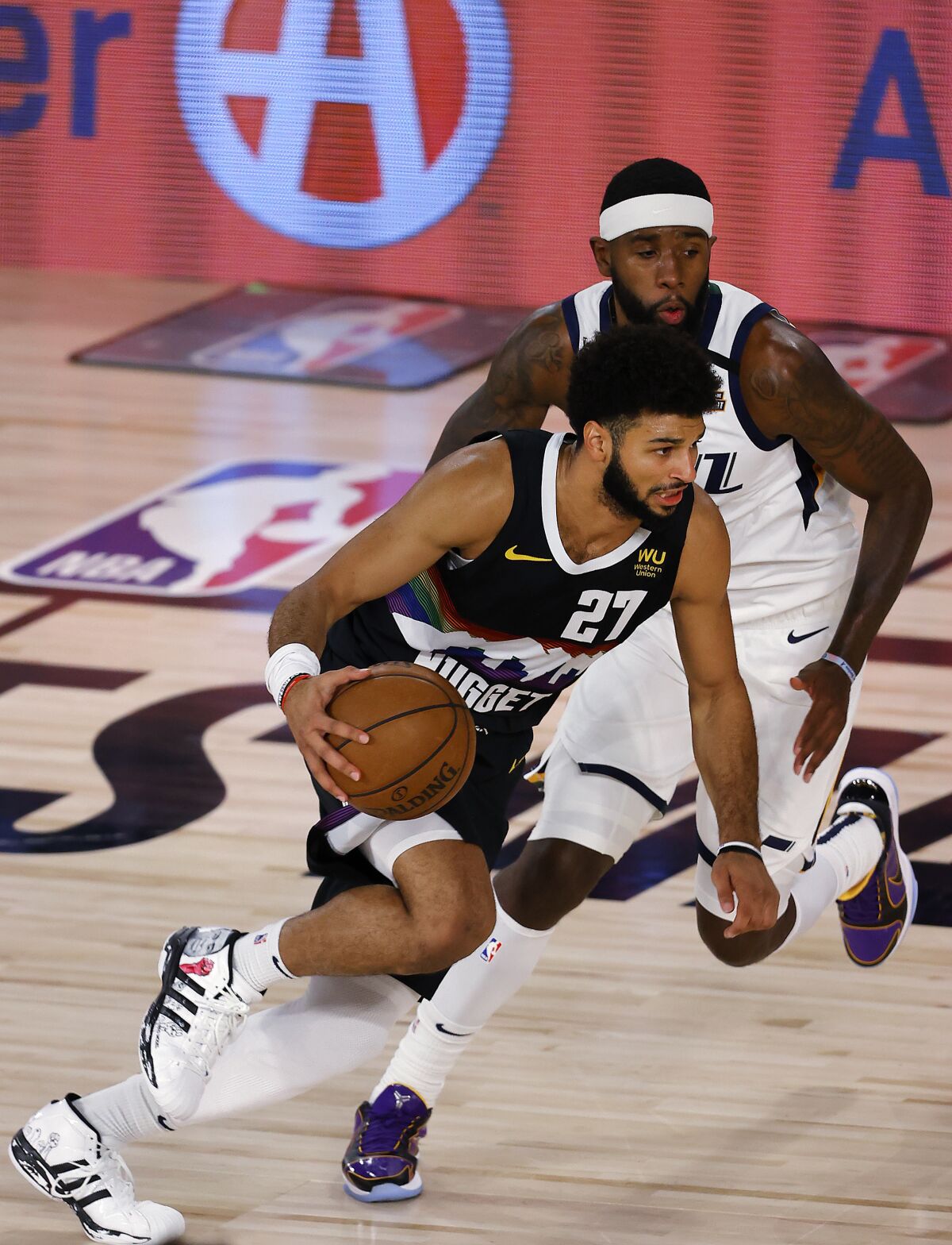 Denver Nuggets' Jamal Murray drives against the Utah Jazz.