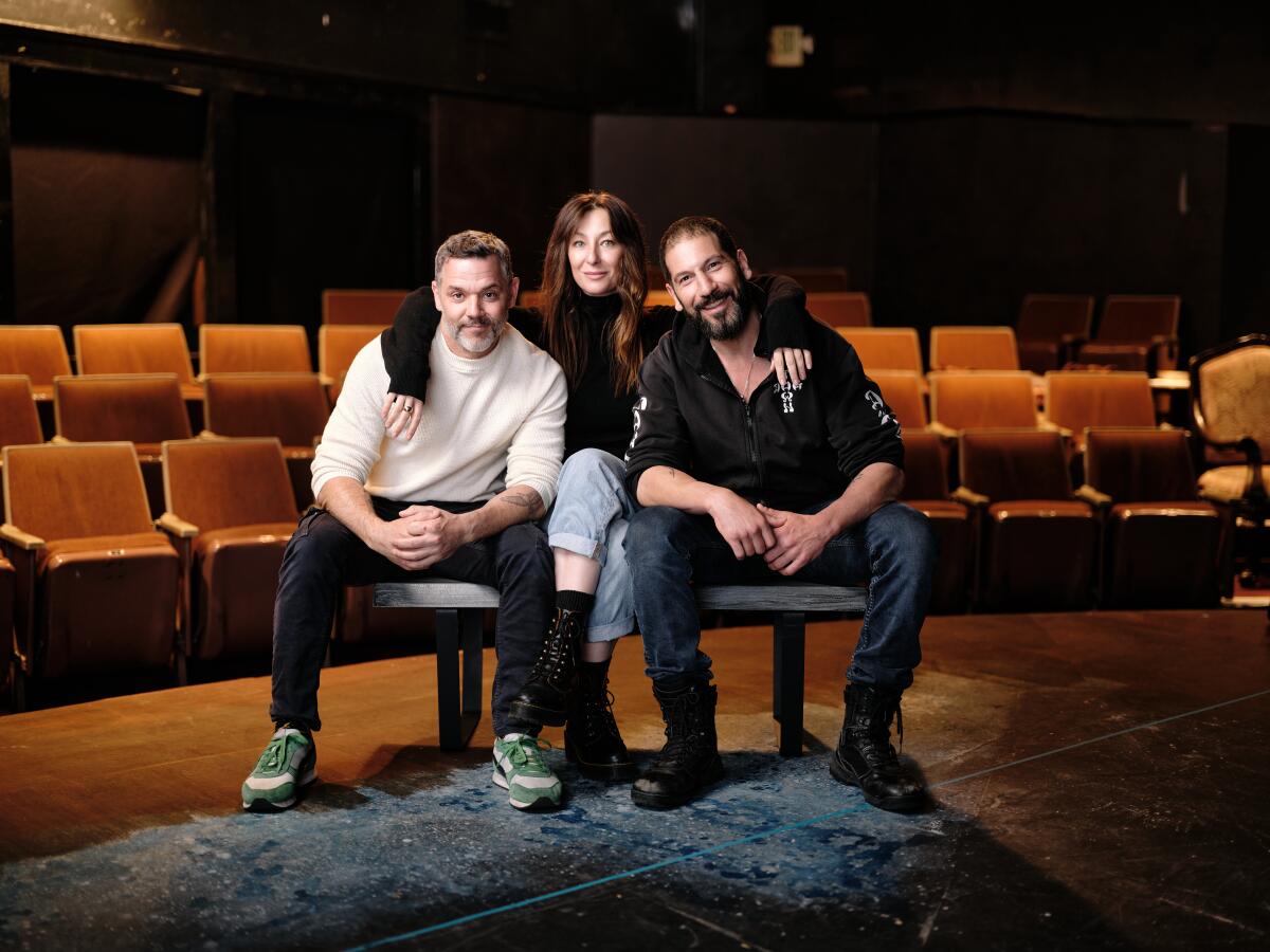 Josh Button, Isidora Goreshter and Jon Bernthal beryllium connected a seat connected signifier successful beforehand of rows of seats successful a theater.