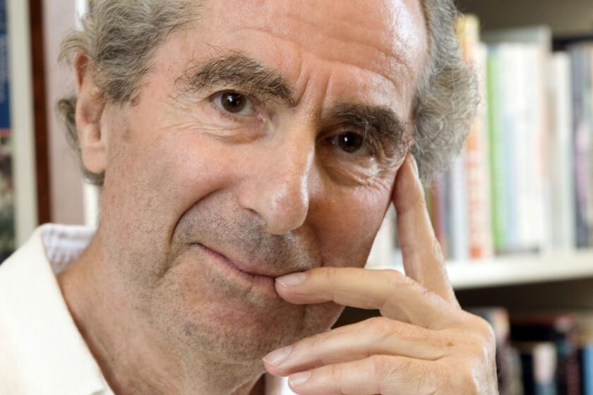 FILE - In this Sept. 8, 2008, file photo, author Philip Roth poses for a photo in the offices of his publisher, Houghton Mifflin, in New York. Roth, prize-winning novelist and fearless narrator of sex, religion and mortality, has died at age 85, his literary agent said Tuesday, May 22, 2018. (AP Photo/Richard Drew, File)