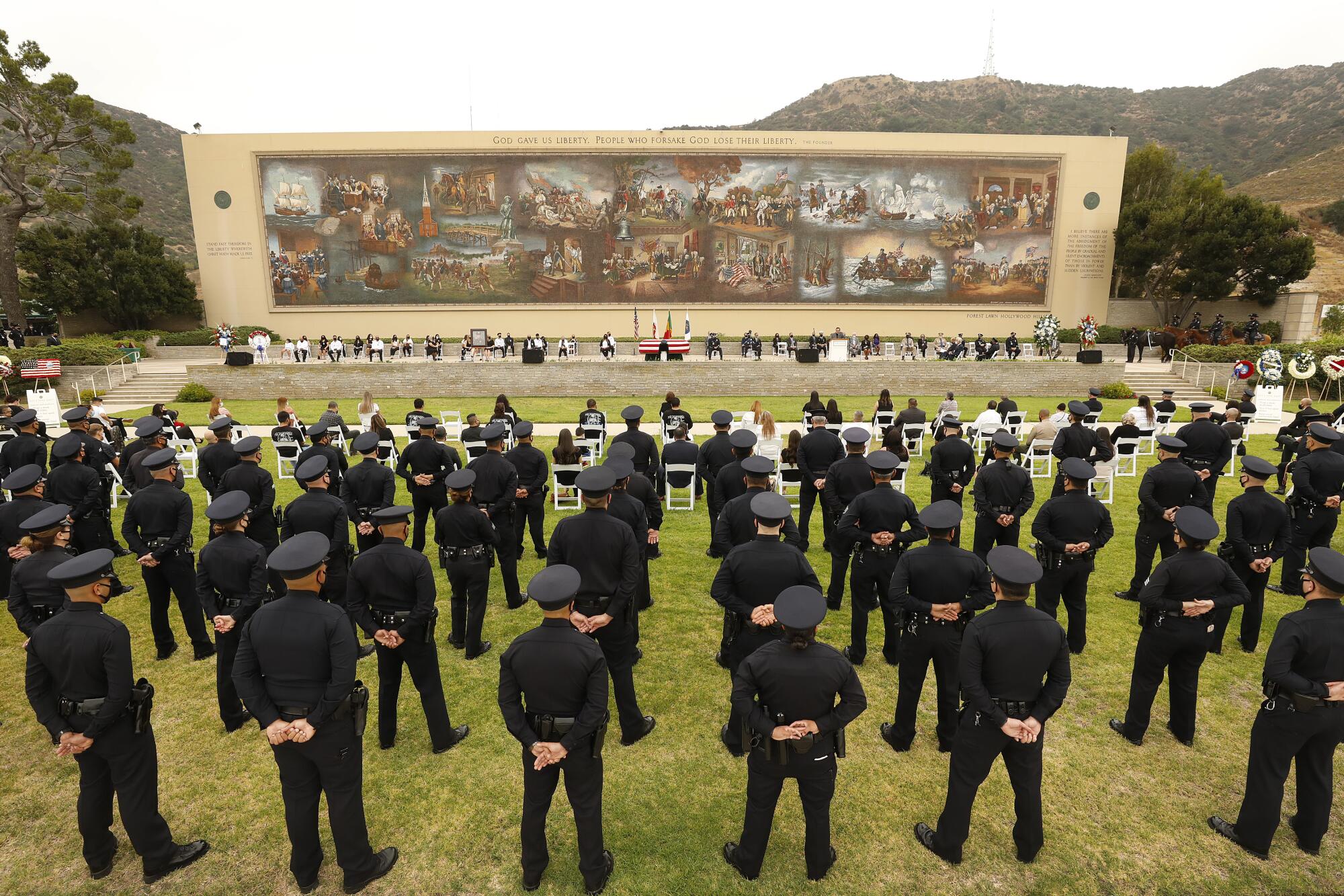 LAPD officers attend the funeral for Officer Valentin Martinez at Forest Lawn Hollywood Hills.