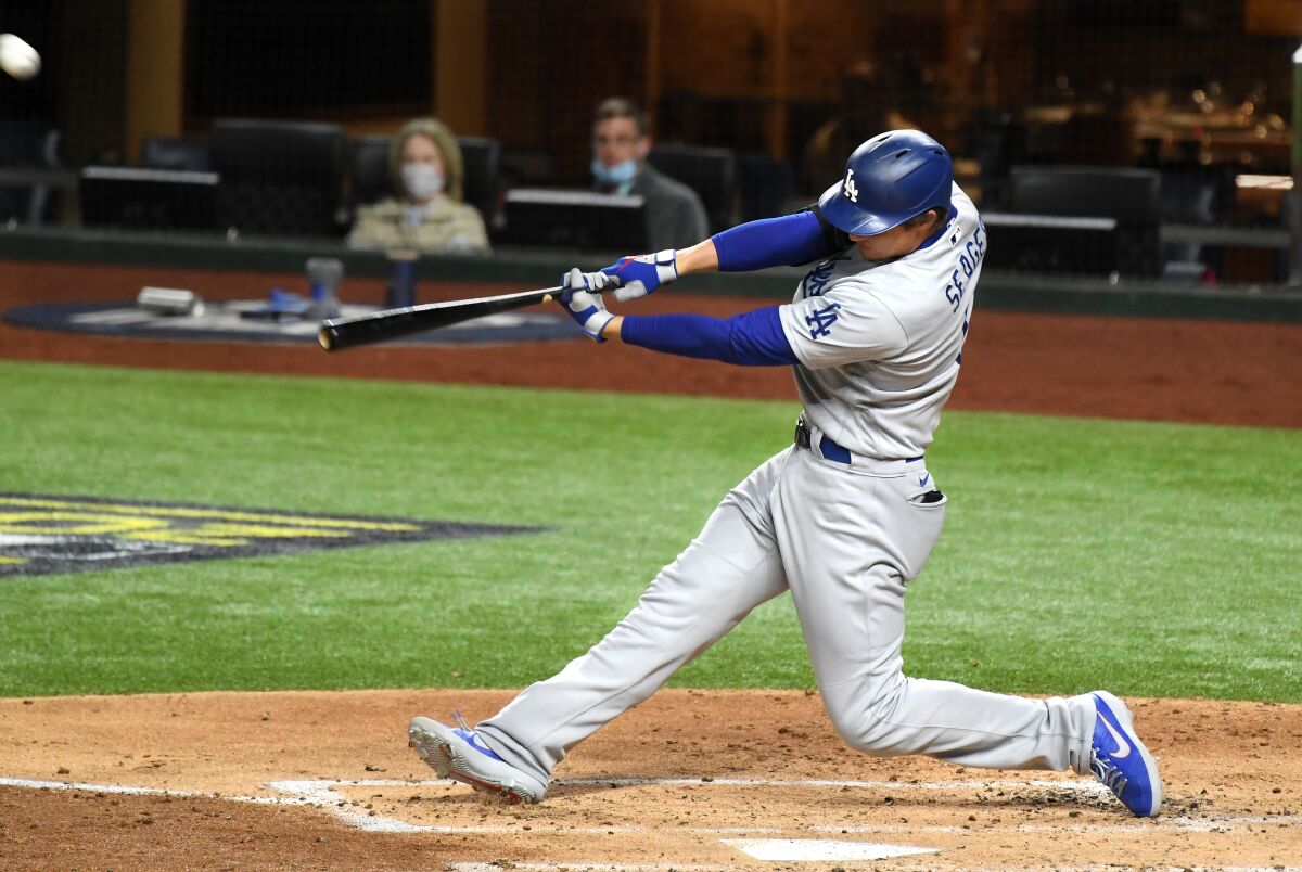 Dodgers shortstop Corey Seager hits a solo home run against the Tampa Bay Rays.