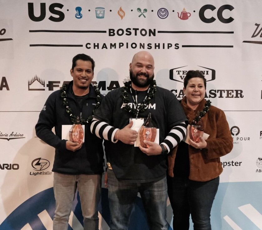 Nick Berardi of San Diego's Mostra Coffee, center, at the 2022 U.S. Coffee Championships in April.