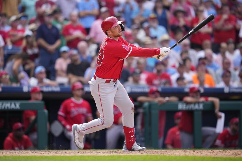 Los Angeles Angels' Brandon Drury watches after hitting a home run during a baseball game, Wednesday, Aug. 30, 2023, in Philadelphia. (AP Photo/Matt Slocum)