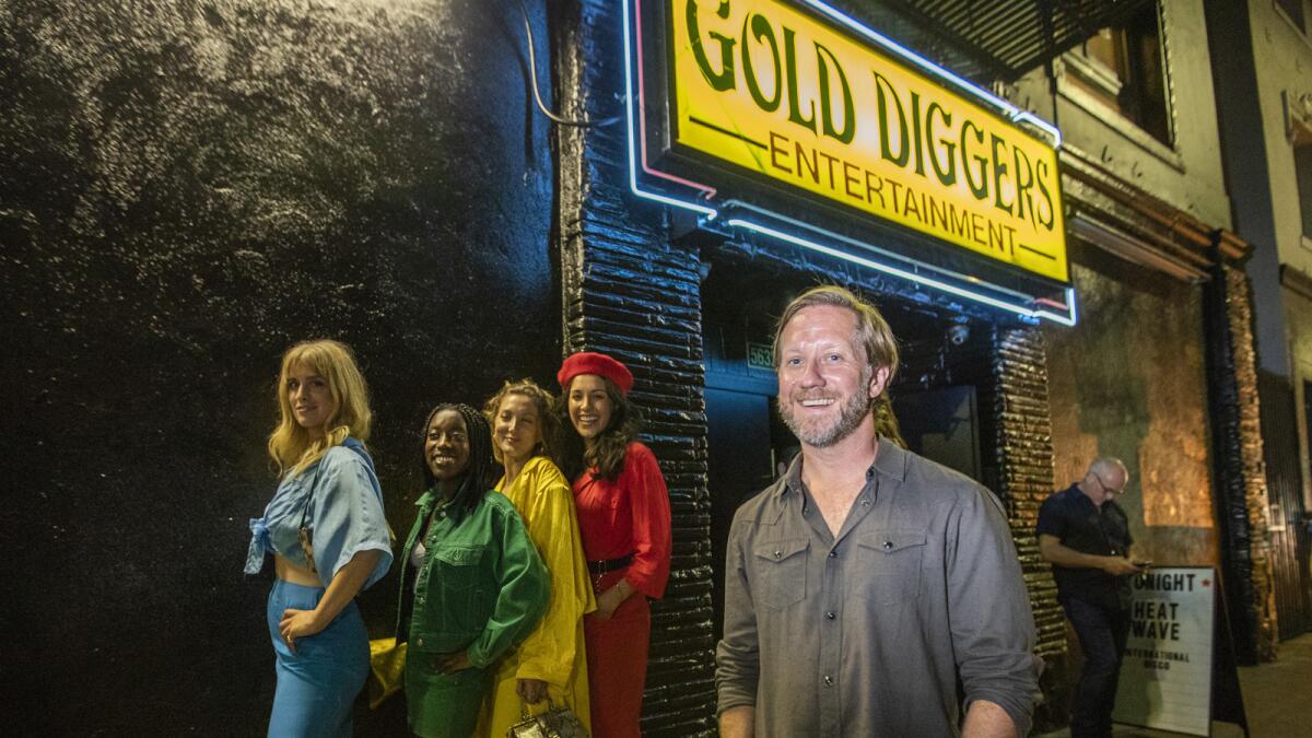 Gold Diggers owner Dave Neupert in the front of the notoriously tawdry strip club, now a home base for underground disco, with a new boutique hotel and recording complex to keep the party going.