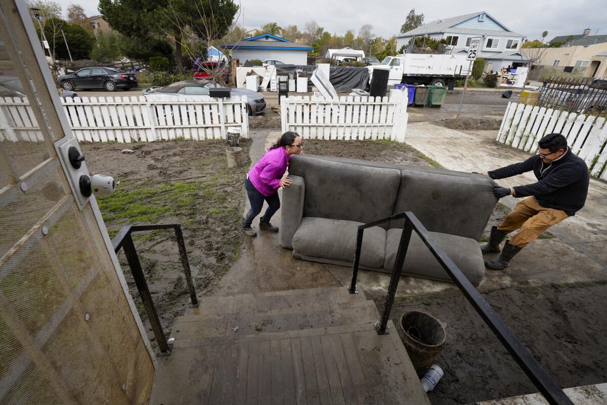 On Wednesday, Jan. 24, Jose and his wife Martha Navarro hauled a couch out of their home on Beta Street.
