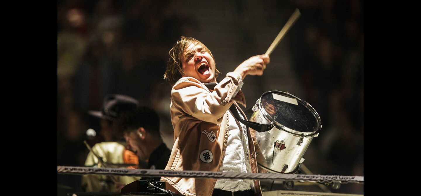 William Butler of Arcade Fire performs at Viejas Arena.