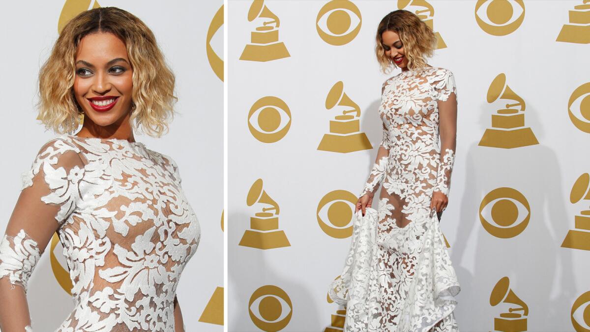 Beyonce's sheer white floral lace gown was exactly the kind of risque style statement we expect to see on music's biggest night. The dress was created by Los Angeles-based designer and "Project Runway" alum Michael Costello.