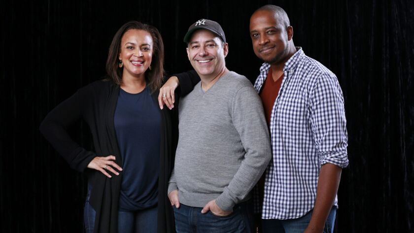 Director James Vásquez (center) with "Tiny Beautiful Things" cast members Opal Alladin and Keith Powell.